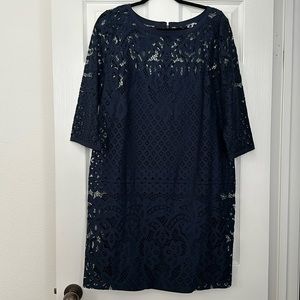 Navy lace shift style dress fully lined.